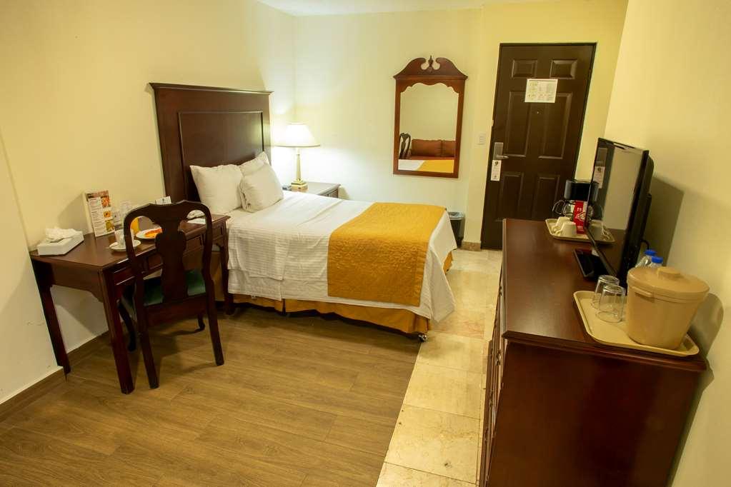 Hotel Plaza Calzada Monterrey Quarto foto